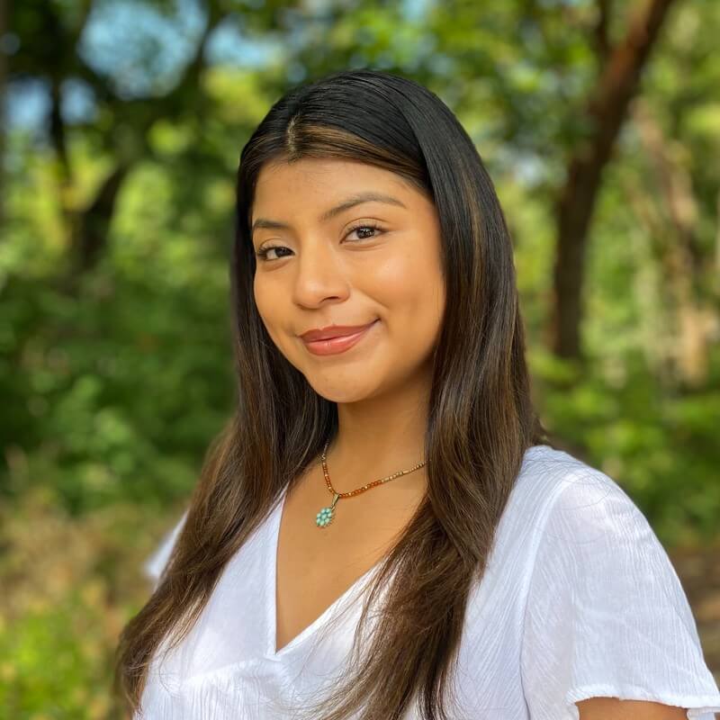 Picture of a female representing person wearing a white shirt